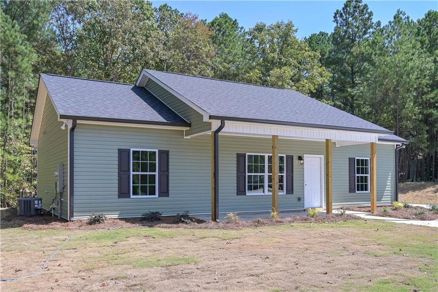 Front exterior of a new home in , Temple, GA, highlighting curb appeal (Image 19).