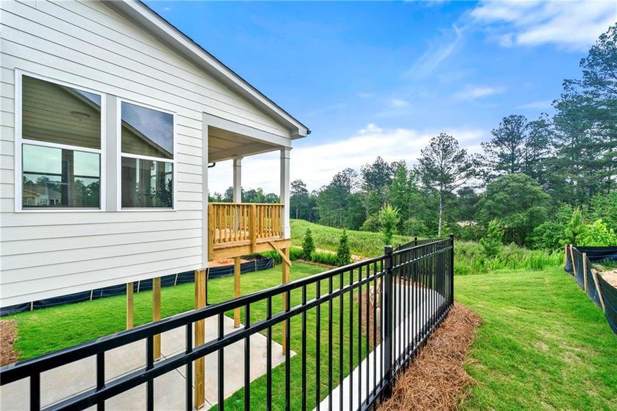 Exterior details and patio area of a home in Cresswind Georgia at Twin Lakes, Hoschton (Image 16).