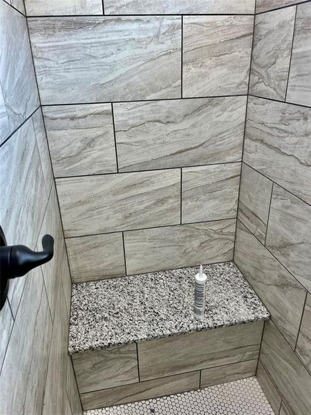 Bathroom with tiled shower