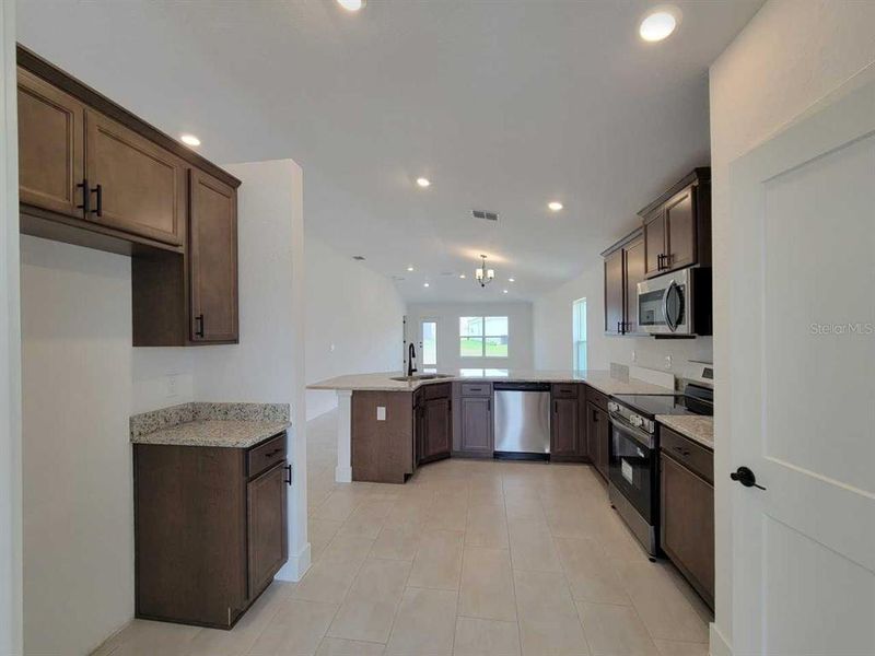 Furnished interior view inside a new home in Ocala Crossings South, Ocala (Image 6).