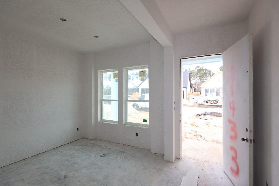 In-progress construction of a new home in Two Step Farm 42', Montgomery, TX (Image 11).