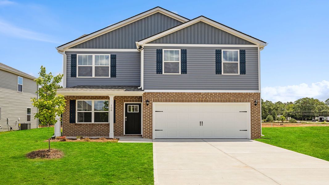 Front exterior of a new home in Chestnut Ridge, Greenville, SC, highlighting curb appeal (Image 1). Front exterior of a new home in Chestnut Ridge, Greenville, SC, highlighting curb appeal (Image 1).