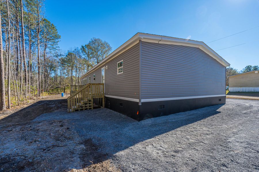 Exterior details and patio area of a home in , Summerville (Image 16).