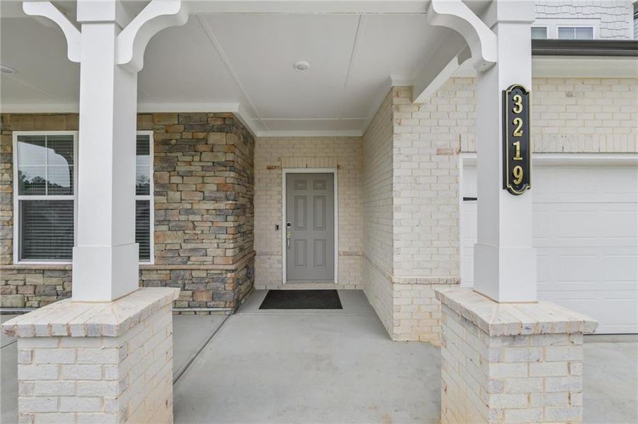 Exterior details and patio area of a home in Bailey Fence, Dacula (Image 23).