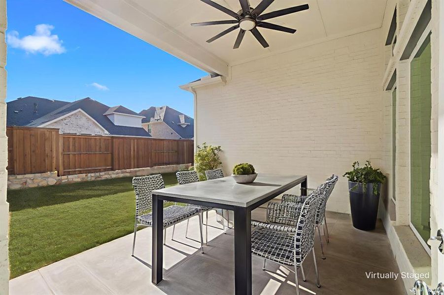 Exterior details and patio area of a home in Windsong Ranch 61' Series, Prosper (Image 25).