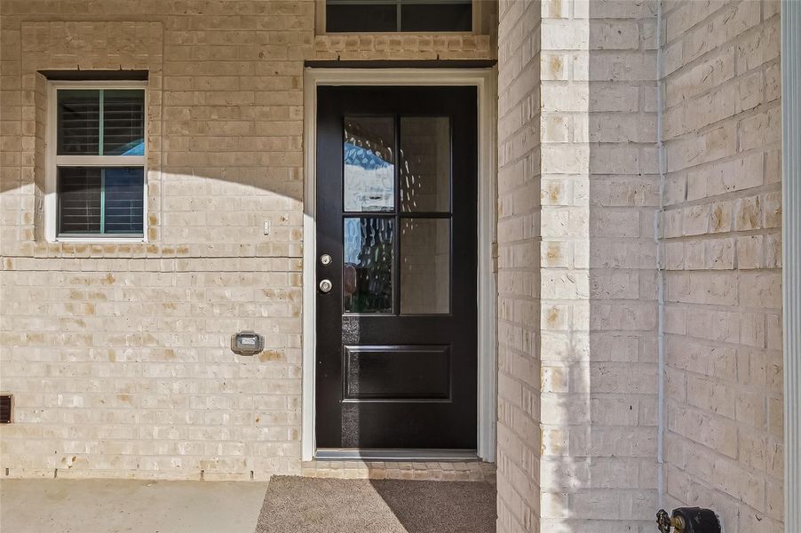 Exterior details and patio area of a home in , Brookshire (Image 28).
