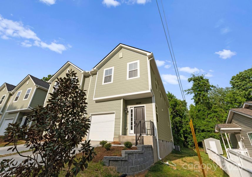 Front exterior of a new home in , Charlotte, NC, highlighting curb appeal (Image 17).