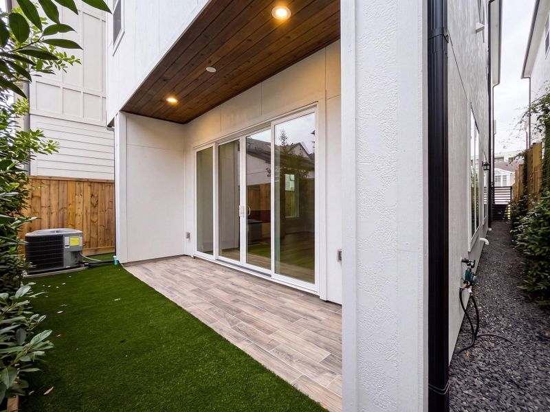 Exterior details and patio area of a home in , Houston (Image 19).