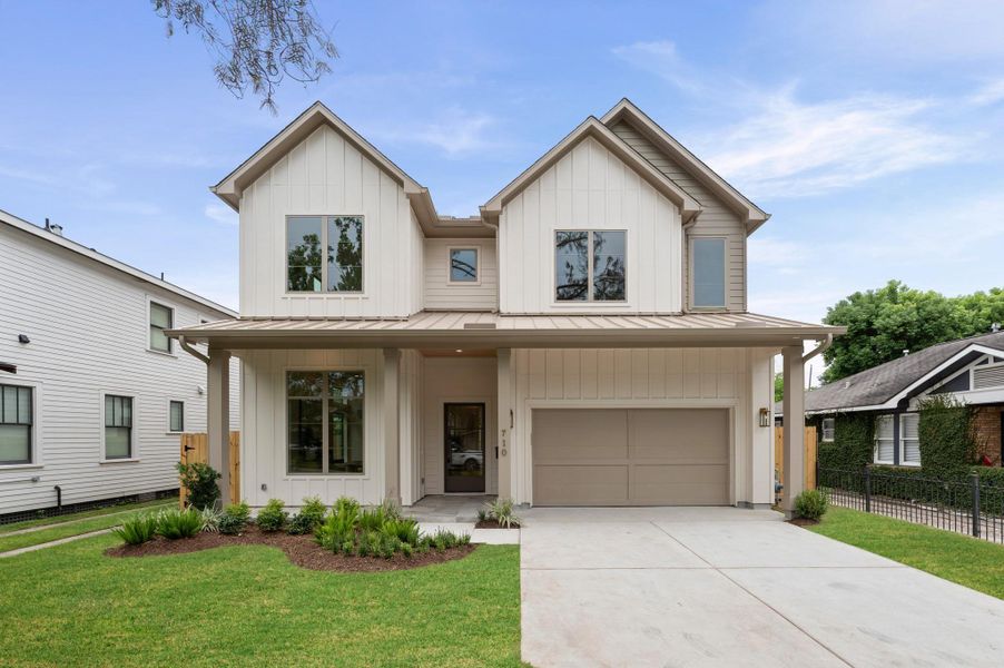 Front exterior of a new home in , Houston, TX, highlighting curb appeal (Image 1).