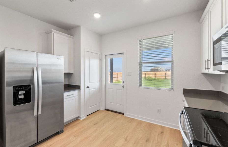 Furnished interior view inside a new home in Sonterra, Jarrell (Image 8).