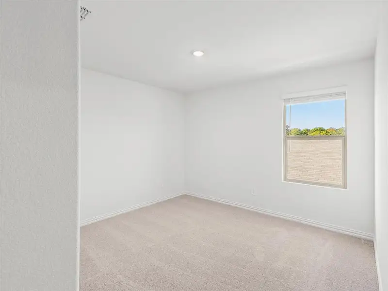 Spacious, unfurnished interior of a new home in Simpson Crossing - Spring Series, McKinney (Image 20).