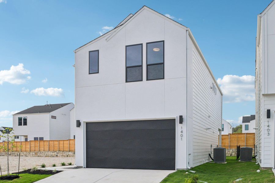 Front exterior of a new home in Novel, Austin, TX, highlighting curb appeal (Image 27).