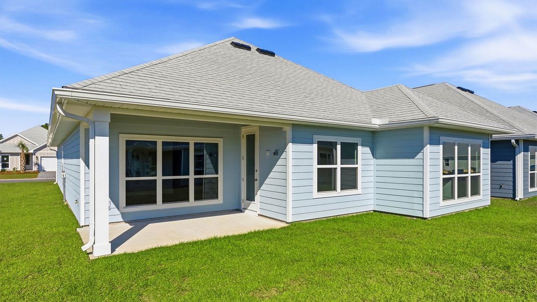 Exterior details and patio area of a home in WindMark Beach, Port Saint Joe (Image 3).