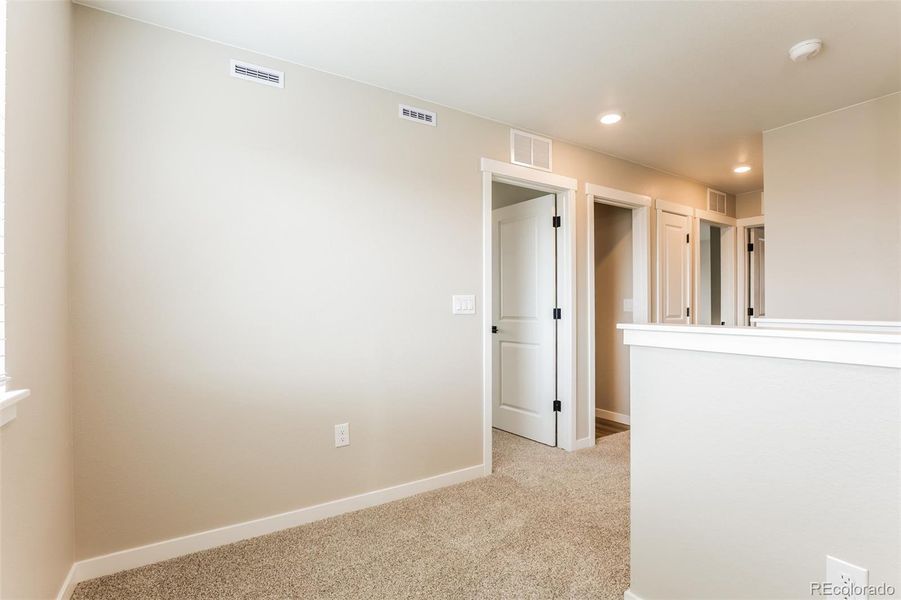 Spacious, unfurnished interior of a new home in Second Creek Farm, Commerce City (Image 10).