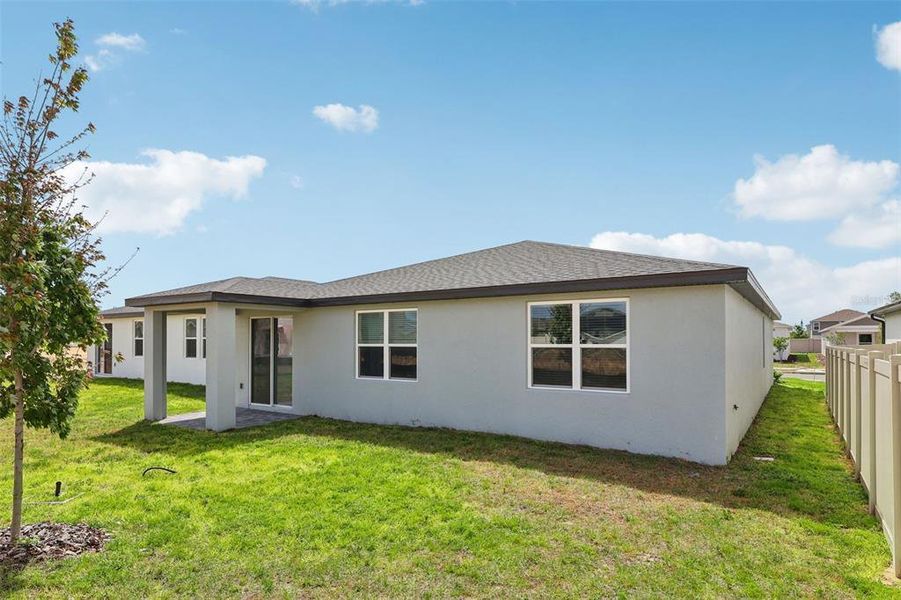 Exterior details and patio area of a home in Crosswinds - Signature Series, Haines City (Image 22).