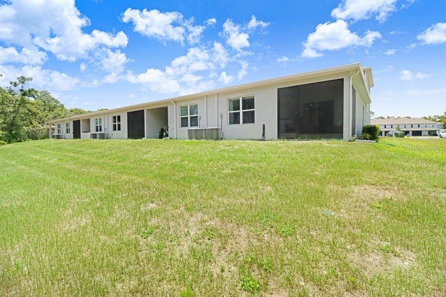 Exterior details and patio area of a home in , New Port Richey (Image 24).