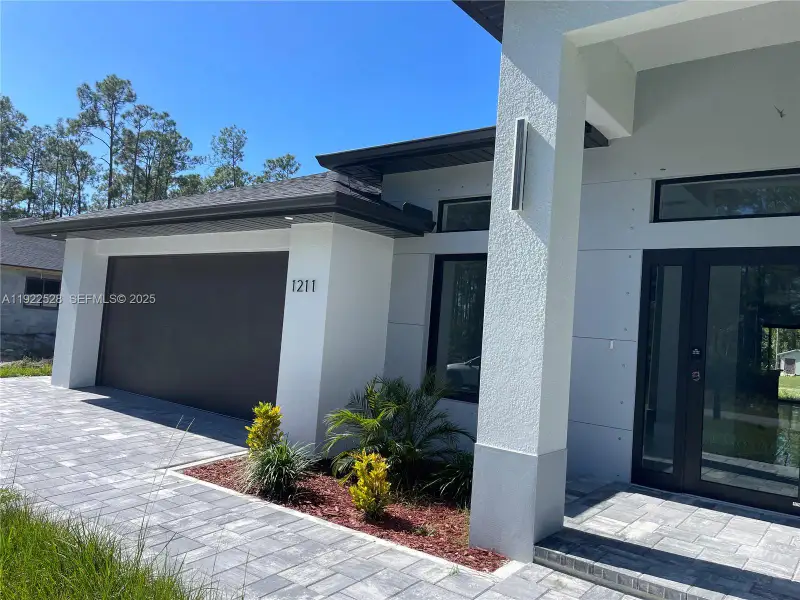 Exterior details and patio area of a home in , Lehigh Acres (Image 4). Exterior details and patio area of a home in , Lehigh Acres (Image 4).
