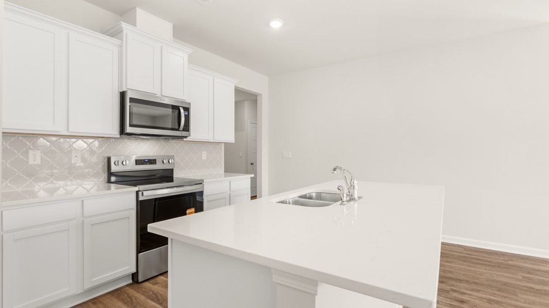 Furnished interior view inside a new home in The Preserve at Agricultural Village, Perry (Image 6).