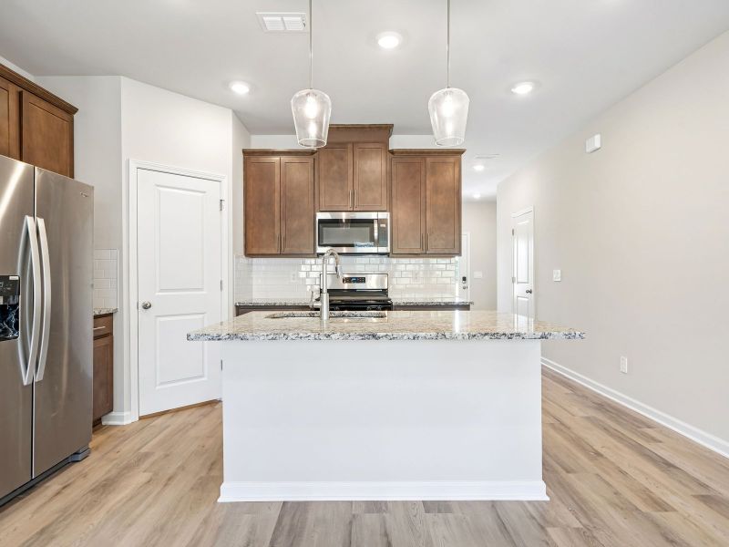 Furnished interior view inside a new home in Brooks Lake, Loganville (Image 4).
