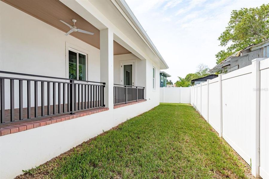 Front exterior of a new home in , Tarpon Springs, FL, highlighting curb appeal (Image 22).