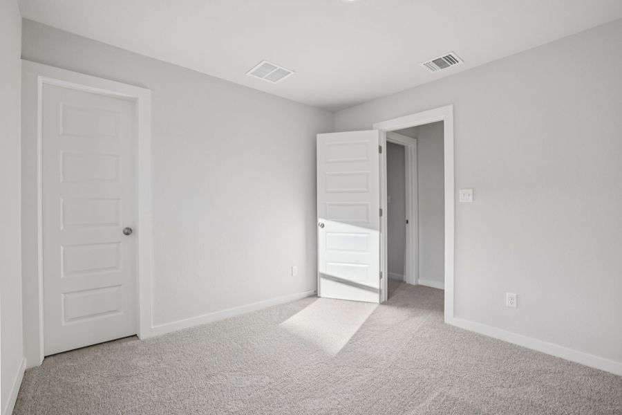 A room with white doors.
