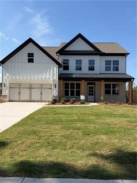 Front exterior of a new home in , Marietta, GA, highlighting curb appeal (Image 16). Front exterior of a new home in , Marietta, GA, highlighting curb appeal (Image 16).