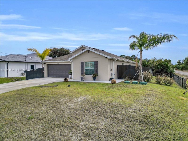 Exterior details and patio area of a home in , Lehigh Acres (Image 3).