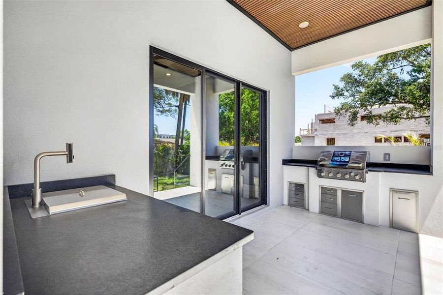 Exterior details and patio area of a home in , Tampa (Image 39).