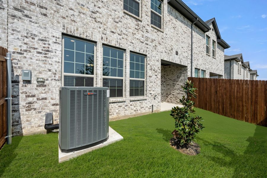 Front exterior of a new home in Main Street Village, Mansfield, TX, highlighting curb appeal (Image 28). Front exterior of a new home in Main Street Village, Mansfield, TX, highlighting curb appeal (Image 28).