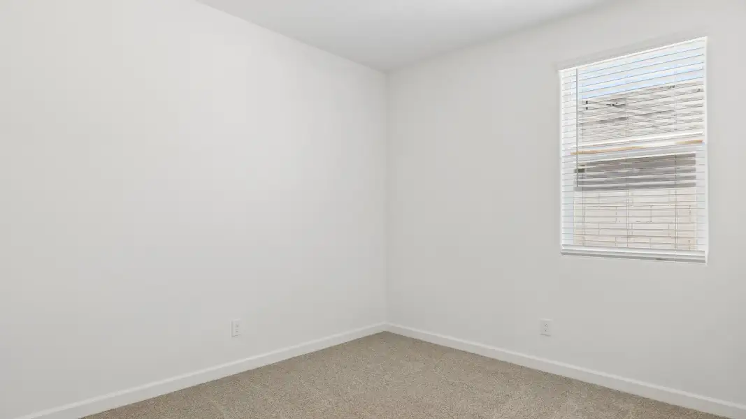 Spacious, unfurnished interior of a new home in Quail Ranch, San Tan Valley (Image 26).