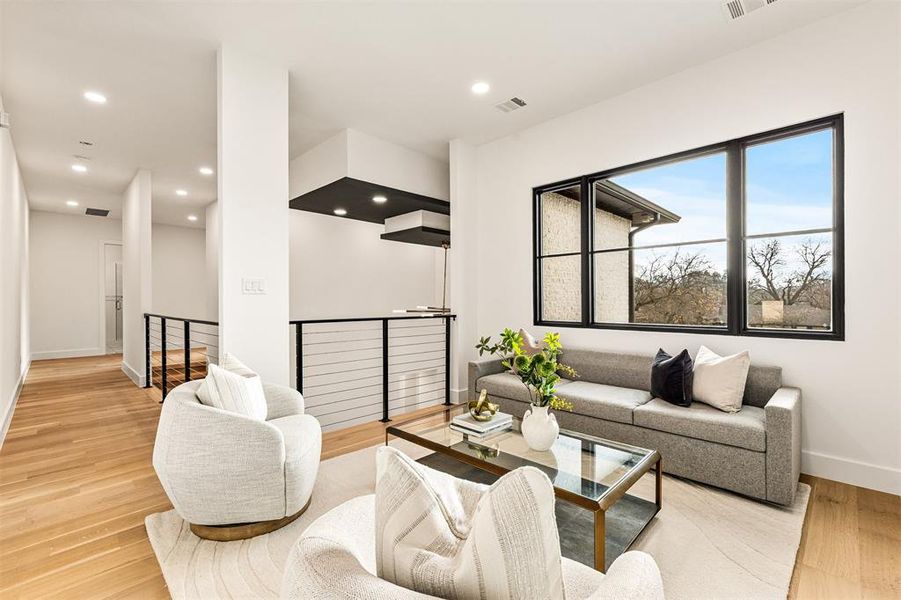 Positioned next to the upstairs bedrooms, this living area works well as a shared space while still allowing everyone their own privacy