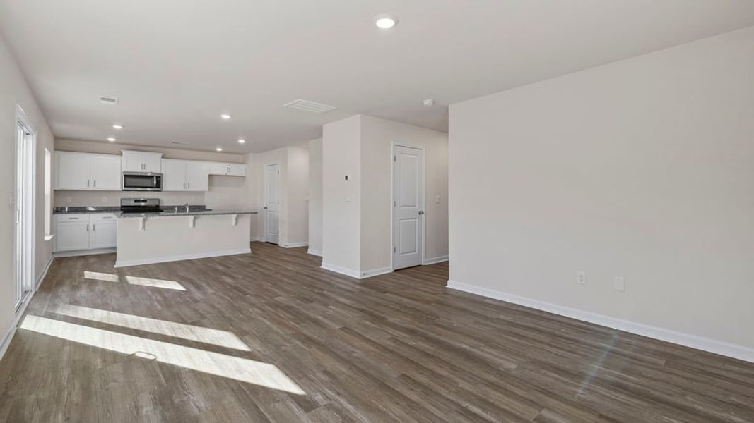 Spacious, unfurnished interior of a new home in Bentley Park, Greenwood (Image 23).
