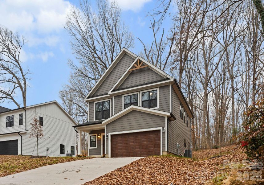 Front exterior of a new home in , Charlotte, NC, highlighting curb appeal (Image 20).