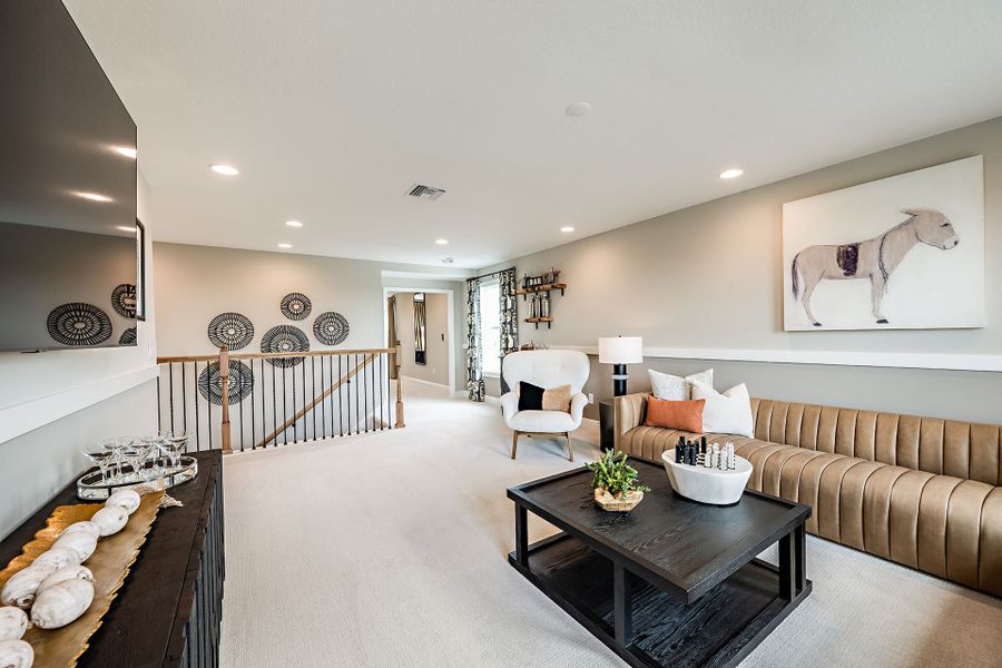 Representative furnished interior of a home built from the Pelican by Homes by WestBay in Crosswind Ranch, Parrish (Image 14).