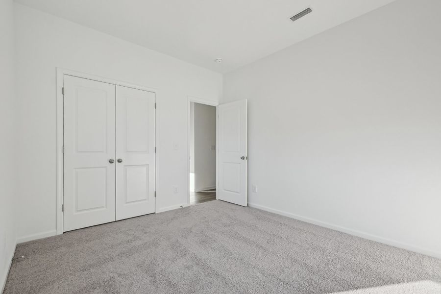 Representative unfurnished interior of a home built from the Timber by Ashton Woods in Middleton Farms, Middlesex (Image 15).
