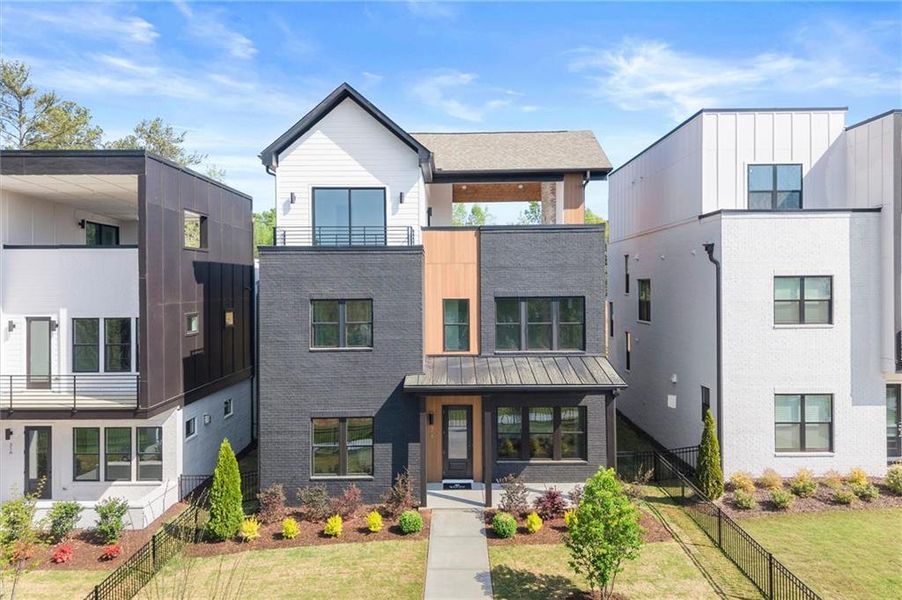 Front exterior of a new home in The Gathering – Alpharetta, Alpharetta, GA, highlighting curb appeal (Image 2). Front exterior of a new home in The Gathering – Alpharetta, Alpharetta, GA, highlighting curb appeal (Image 2).