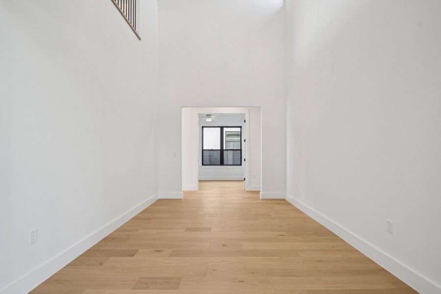 Spacious, unfurnished interior of a new home in Milky Way at River Place, Austin (Image 21).