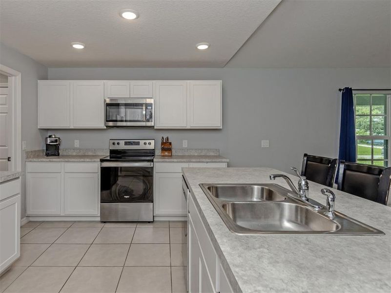 Furnished interior view inside a new home in , Port Charlotte (Image 16).
