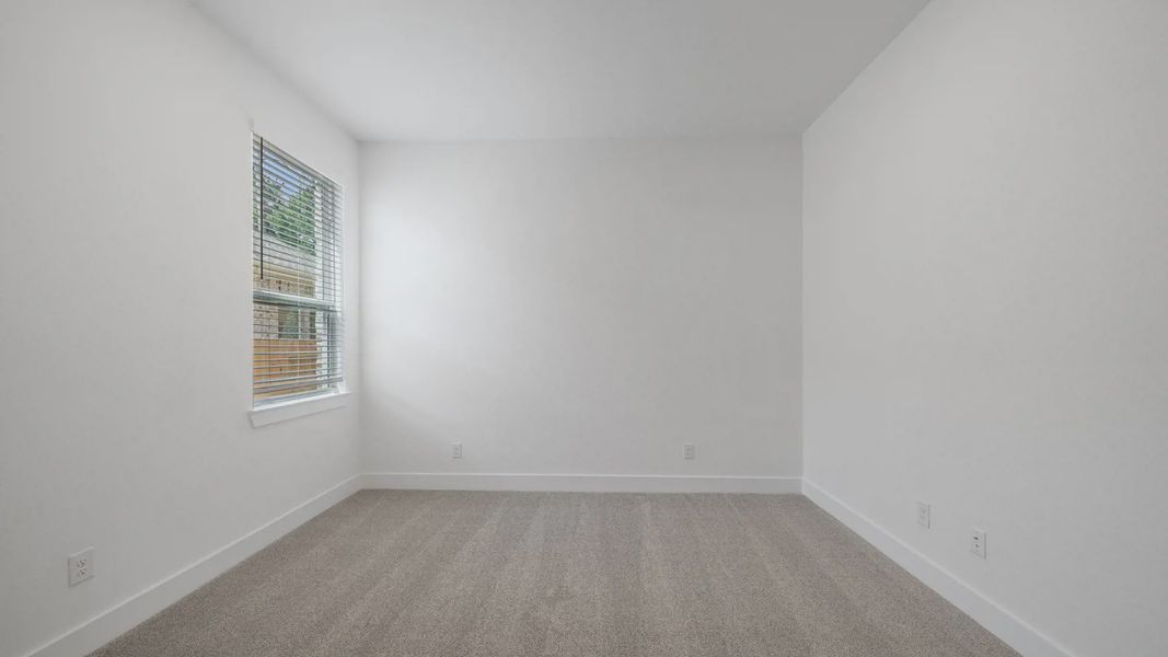 Representative unfurnished interior of a home built from the Waterloo by Chesmar Homes in Sofi Lakes, Katy (Image 33).