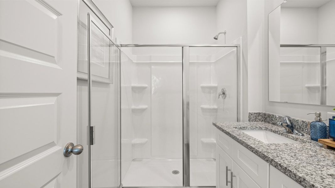 Representative furnished interior of a home built from the Calloway 3 Express by D.R. Horton in Remington Chase, Perry (Image 26).