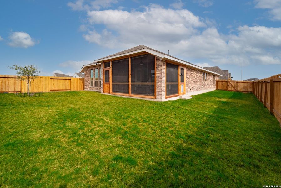 Exterior details and patio area of a home in Meadows of Mill Creek, Seguin (Image 25).