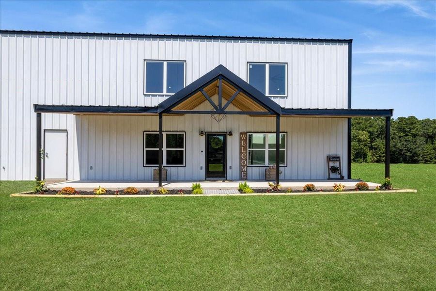Front exterior of a new home in , Diboll, TX, highlighting curb appeal (Image 24). Front exterior of a new home in , Diboll, TX, highlighting curb appeal (Image 24).