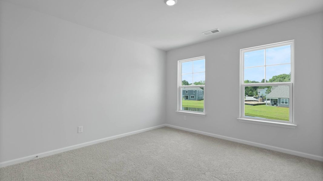 Representative unfurnished interior of a home built from the FORRESTER by D.R. Horton in Founders Corner, Summerville (Image 27).