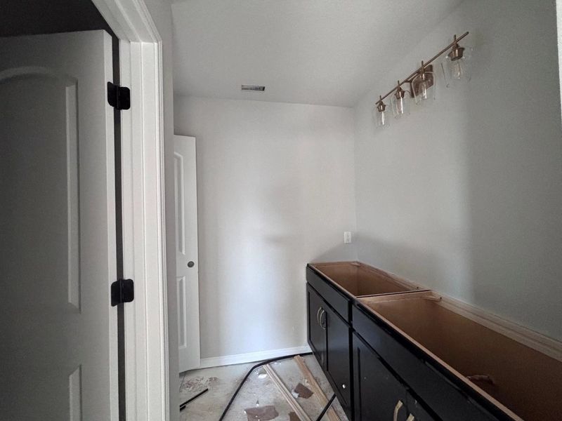 In-progress construction of a new home in The Colony, Bastrop, TX (Image 26).