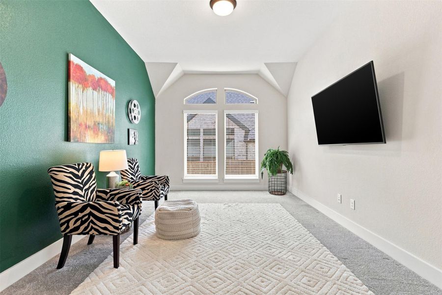 A vibrant accent wall complements the arched window, creating a playful and inviting atmosphere.