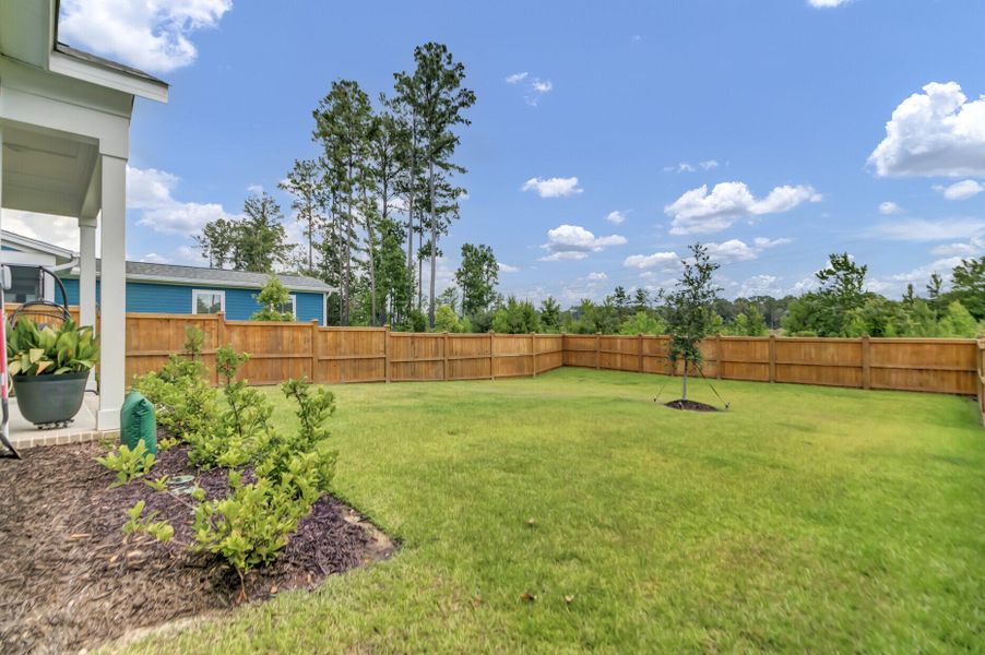 Exterior details and patio area of a home in Midtown at Nexton, Summerville (Image 29).