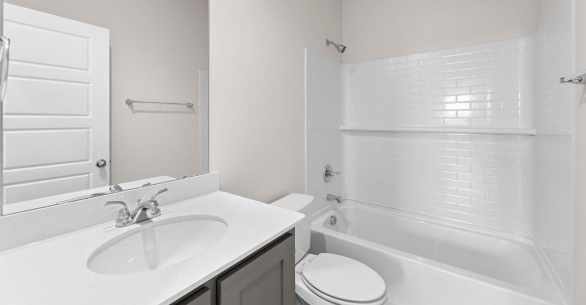 Representative exterior photo of a completed home built from the Willow by Impression Homes in Keeneland, Aubrey, TX (Image 19). Representative exterior photo of a completed home built from the Willow by Impression Homes in Keeneland, Aubrey, TX (Image 19).