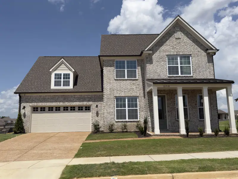 Front exterior of a new home in White Oak, Arlington, TN, highlighting curb appeal (Image 1). Front exterior of a new home in White Oak, Arlington, TN, highlighting curb appeal (Image 1).