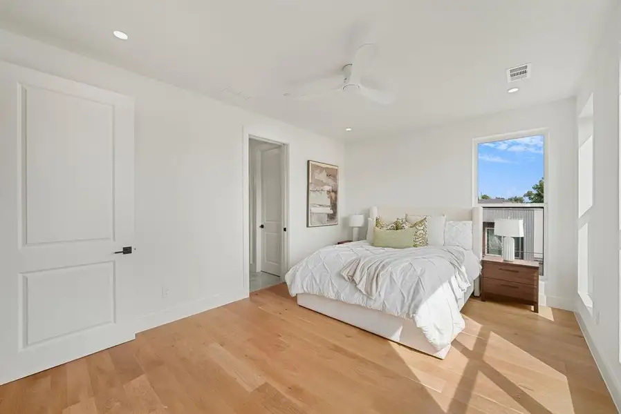 Light wood-finish flooring with white walls Light wood-finish flooring with white walls