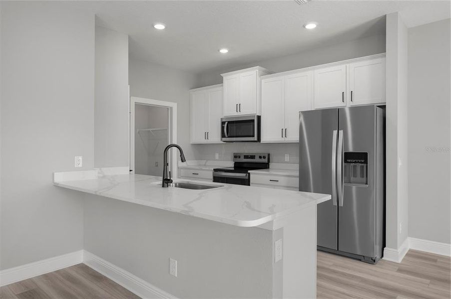 Furnished interior view inside a new home in Gum Lake Preserve, Lake Alfred (Image 6).